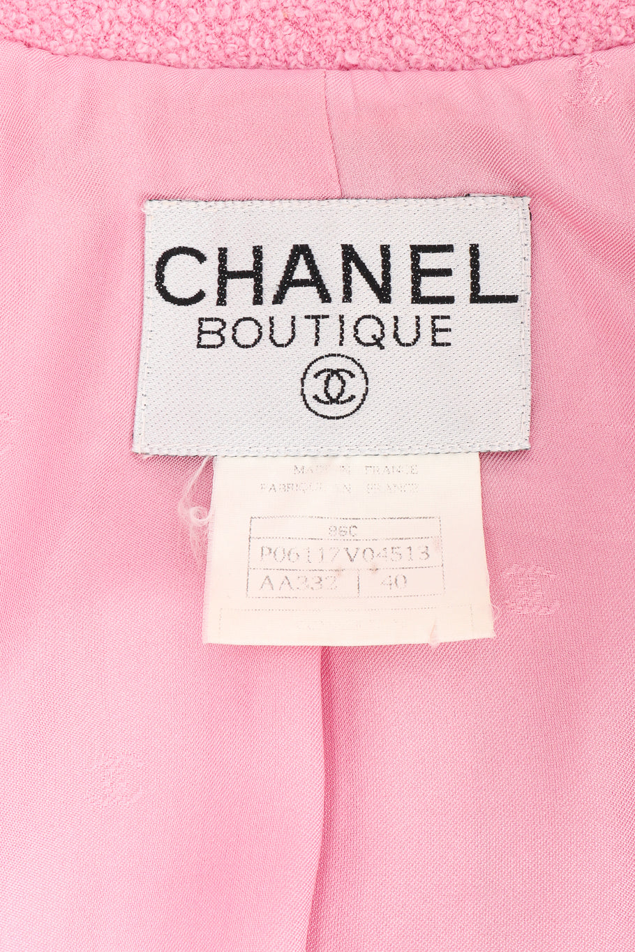 Bouclé knit longline jacket by Chanel label close @recessla