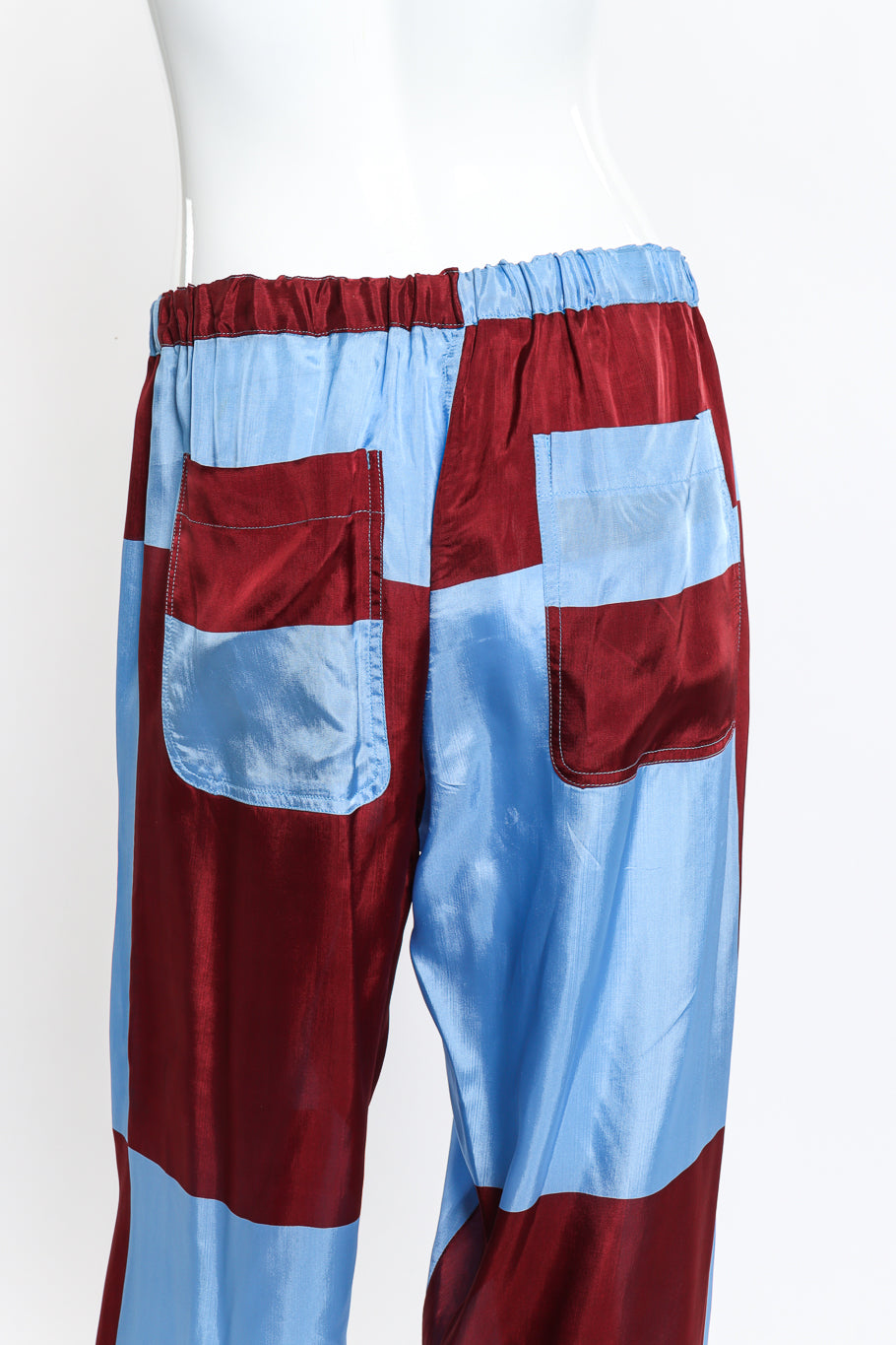 Comme des Garcons Colorblock Checker Pants back on mannequin closeup @recess la