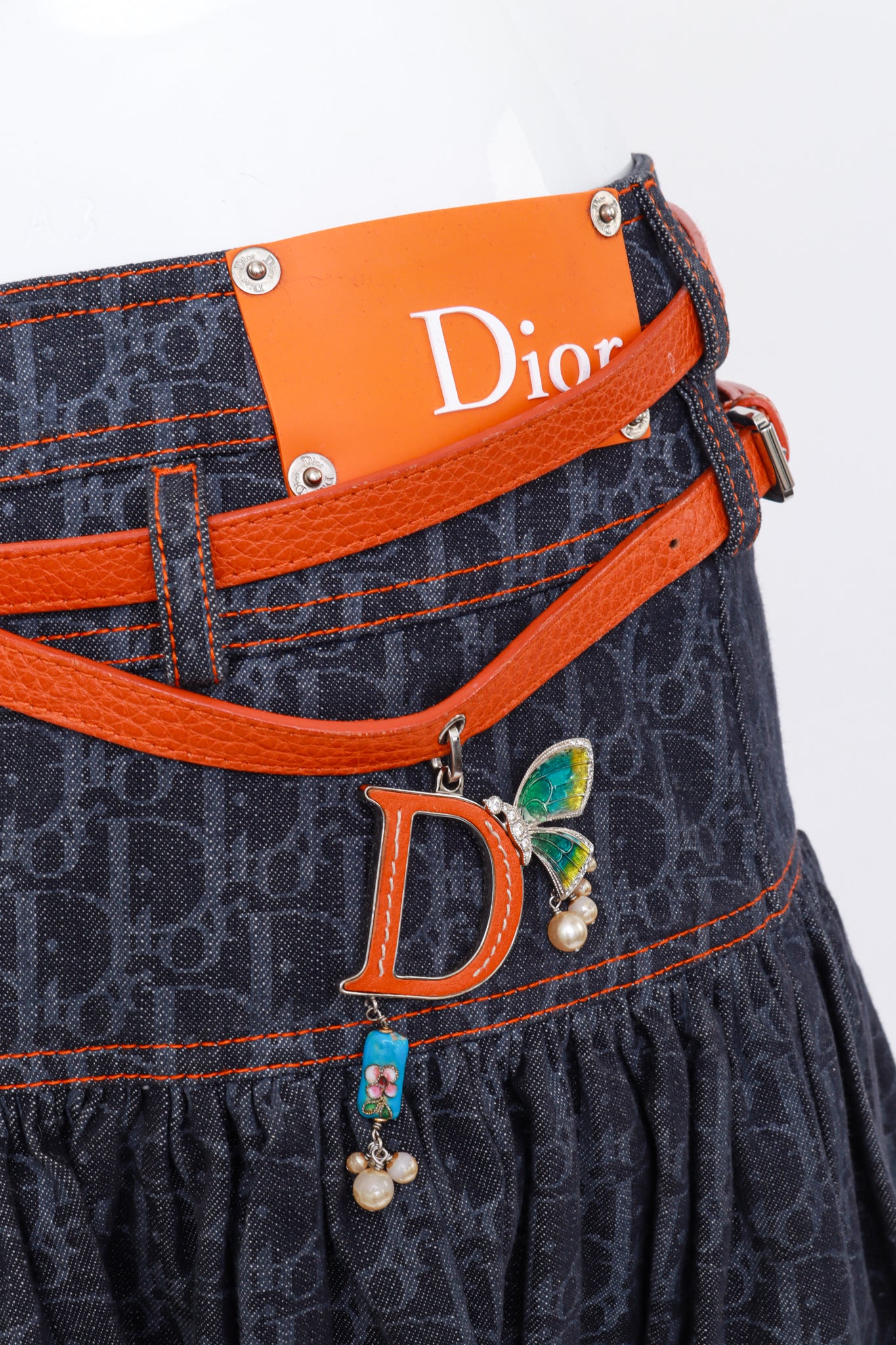 Denim Tiered Skater Skirt by Dior on mannequin charm close @Recess LA