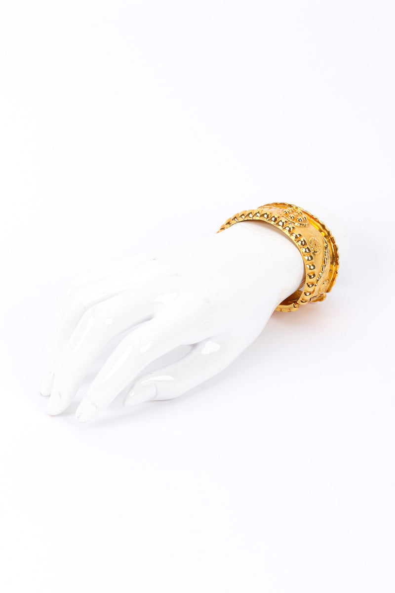 Shiny Sculpted Cuff Bracelet on mannequin wrist far @recessla