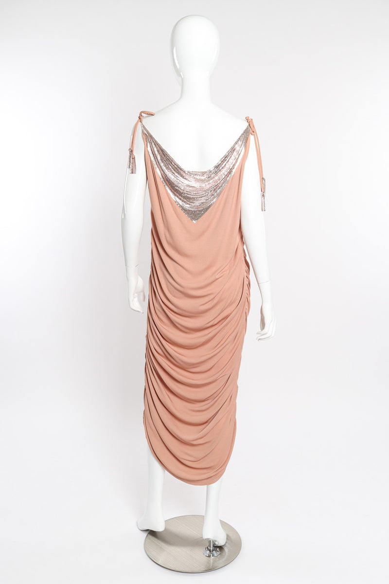 Metal cowl gown by Ferrera on mannequin back @recessla