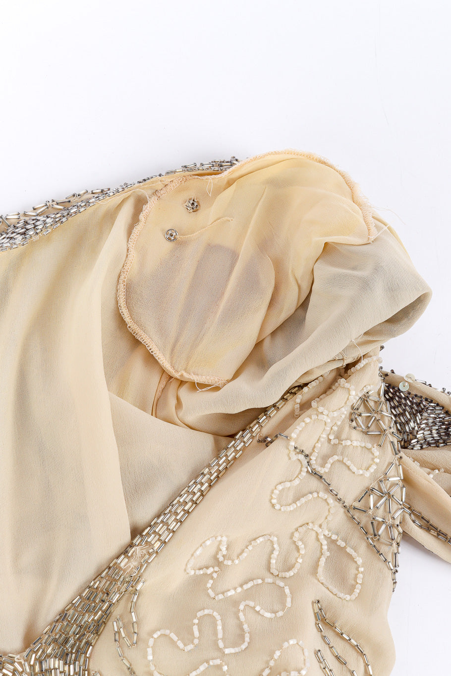Embellished silk dress by Fabrice flat lay inside shoulder pad @recessla