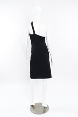 Black mini dress by Gucci on mannequin back @recessla