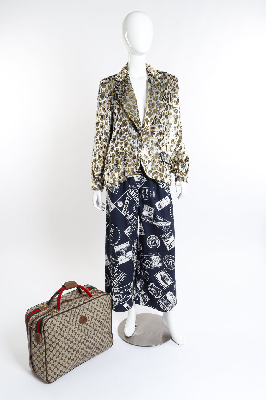 Vintage Gucci Monogram Suitcase next to mannequin @recess la