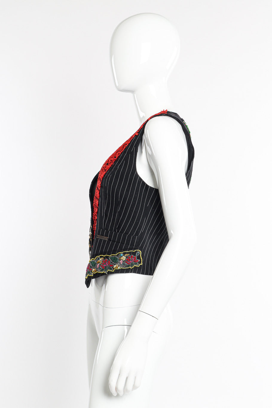 Pinstripe vest by John Galliano on mannequin side @recessla