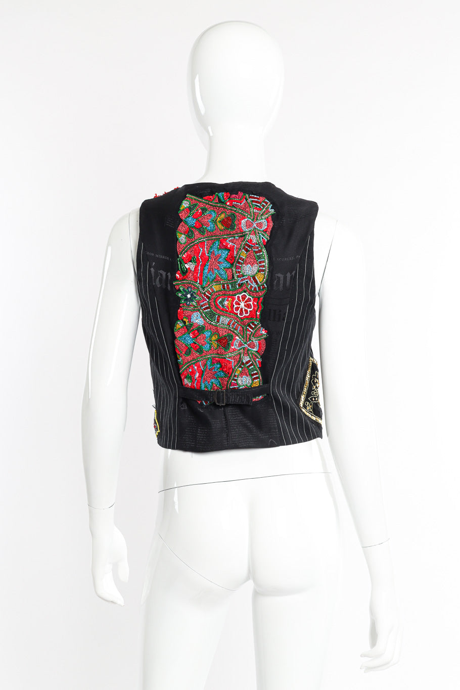Pinstripe vest by John Galliano on mannequin back @recessla
