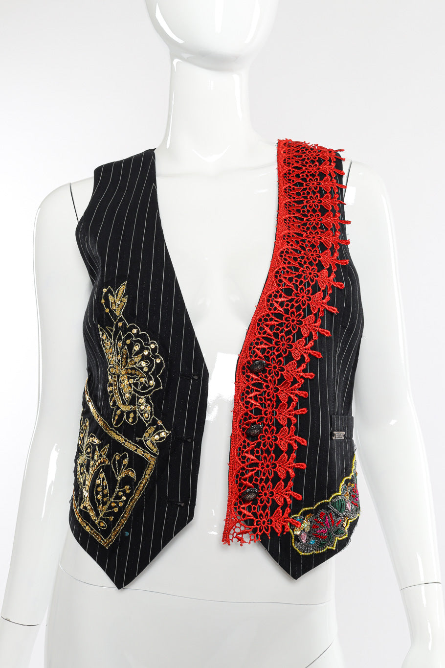 Pinstripe vest by John Galliano on mannequin unbuttoned @recessla