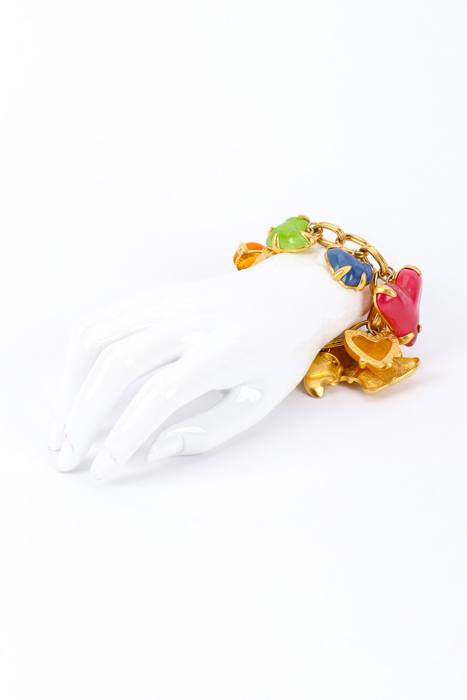 Charm bracelet by Givenchy on white background on mannequin hand @recessla