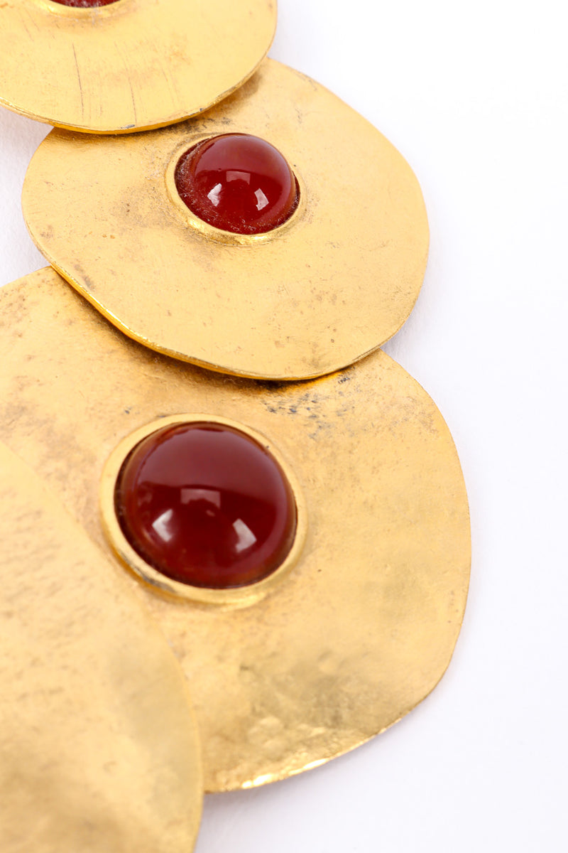 Vintage Modernist Disc Collar Necklace tarnish marks closeup on a white backdrop @Recessla