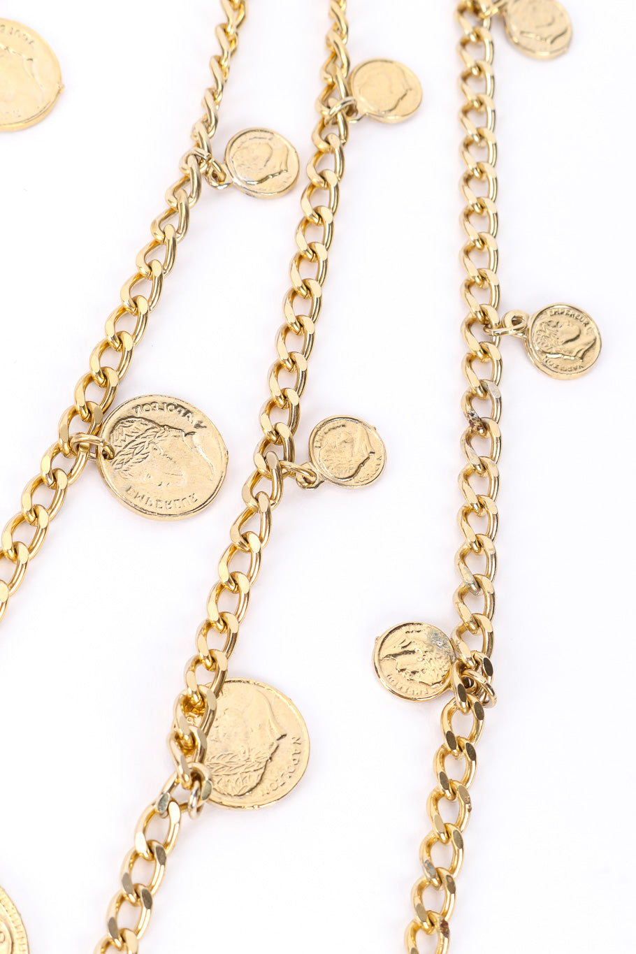 Coin pendant necklace by Goldette on white background 3 vertical coin strands @recessla