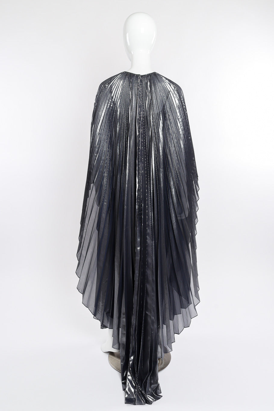Metallic pleated caftan and bodysuit by Halston on mannequin back @recessla
