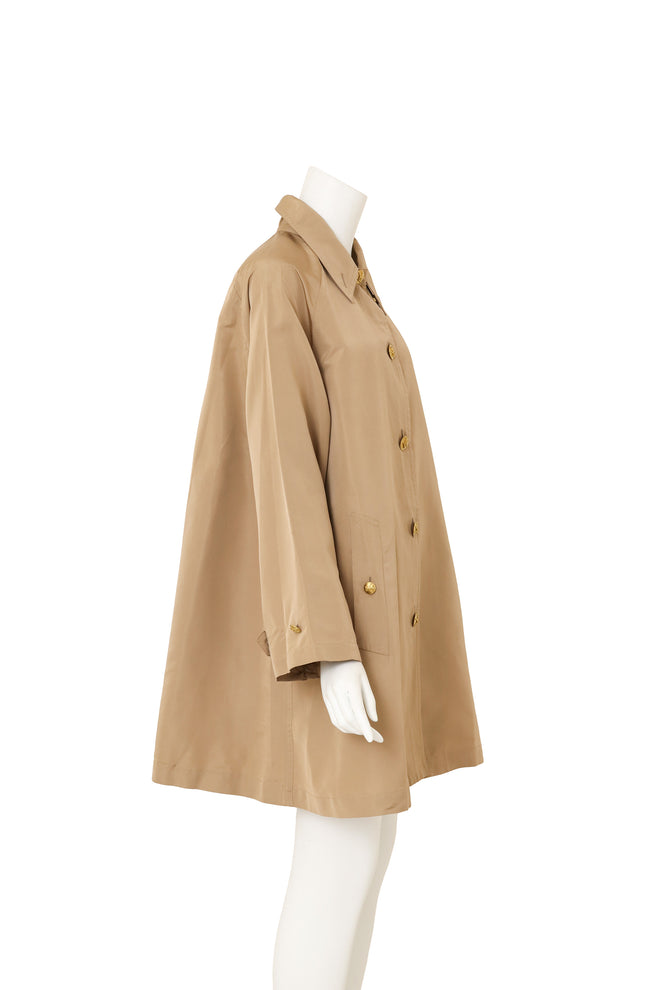 Khaki Silk Swing Coat by Chanel on mannequin side @ Recess LA