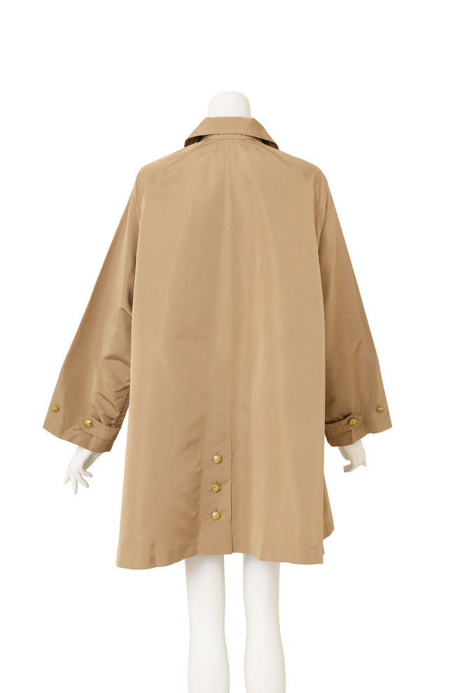 Khaki Silk Swing Coat by Chanel on mannequin back @ Recess LA