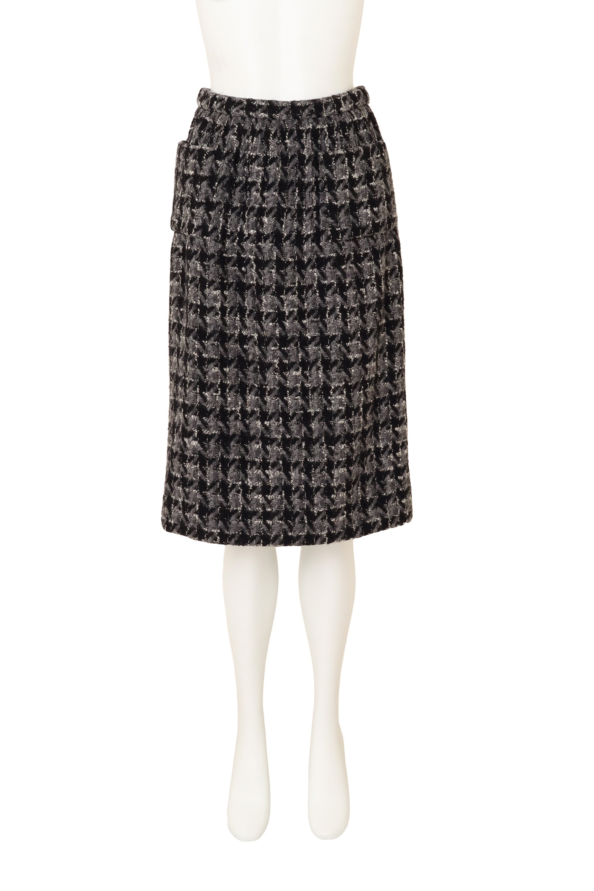 Knot Closure Bouclé Set by Chanel on mannequin skirt only @ Recess LA