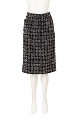 Knot Closure Bouclé Set by Chanel on mannequin skirt only @ Recess LA