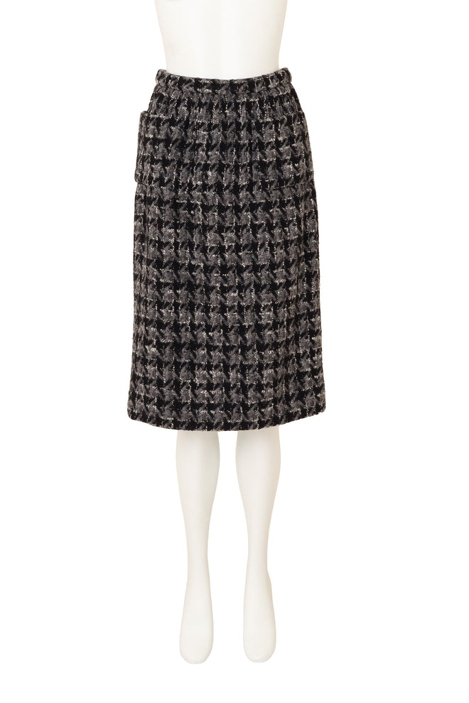 Knot Closure Bouclé Set by Chanel on mannequin skirt only @ Recess LA