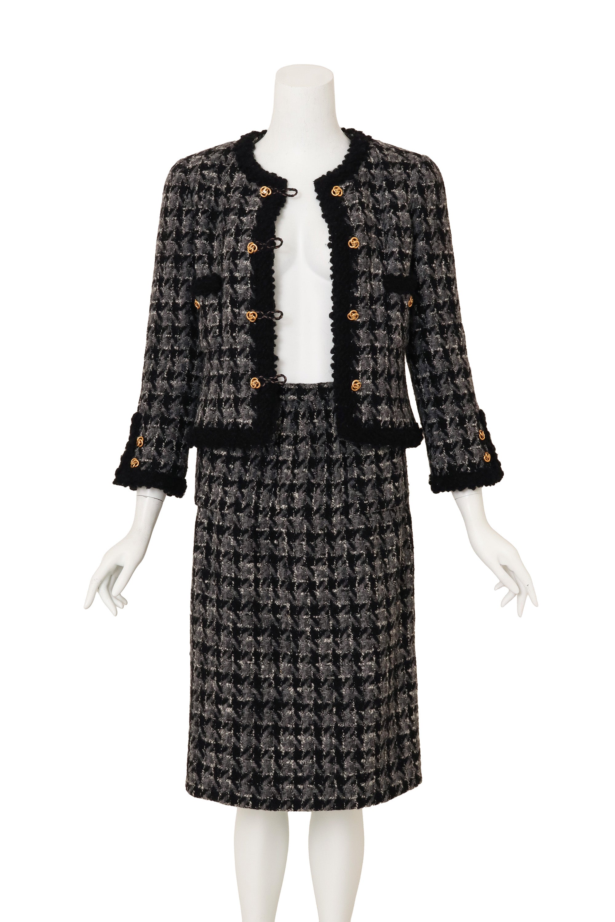 Knot Closure Bouclé Set by Chanel on mannequin jacket open @ Recess LA