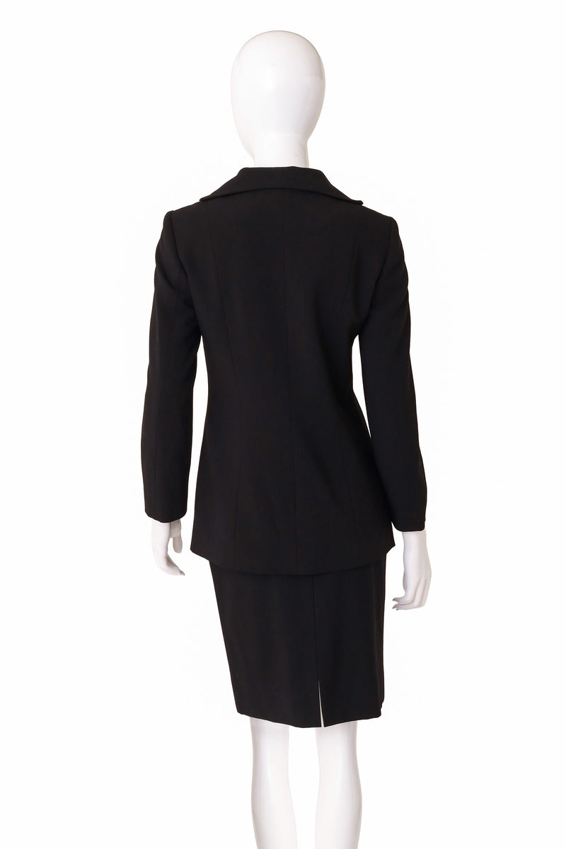  jacket and skirt suit by Mondi on mannequin back @ Recess LA