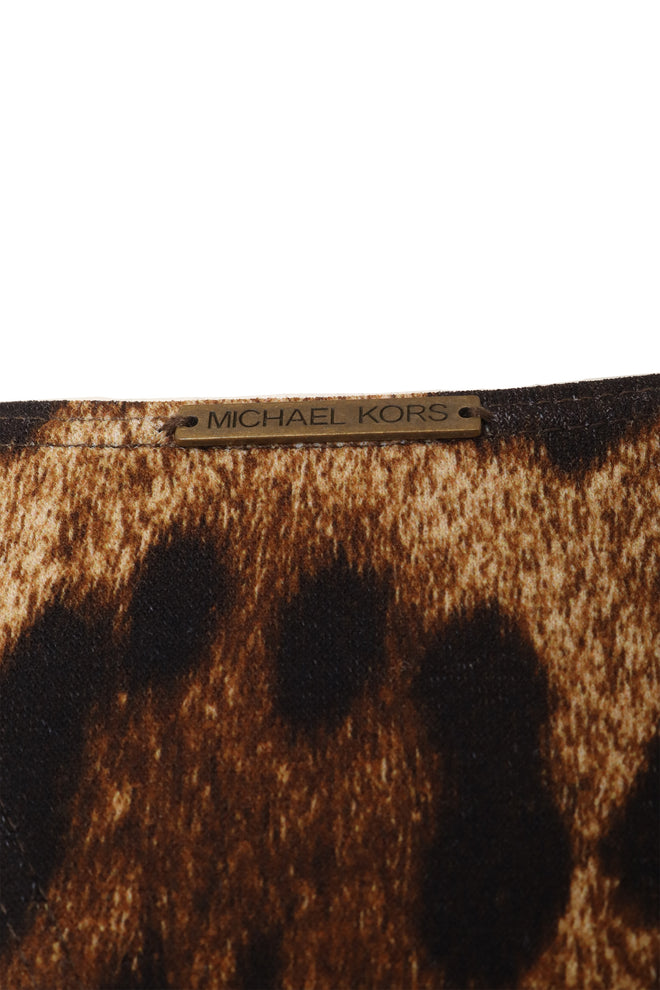 Michael Kors poncho metal tag @ Recess LA