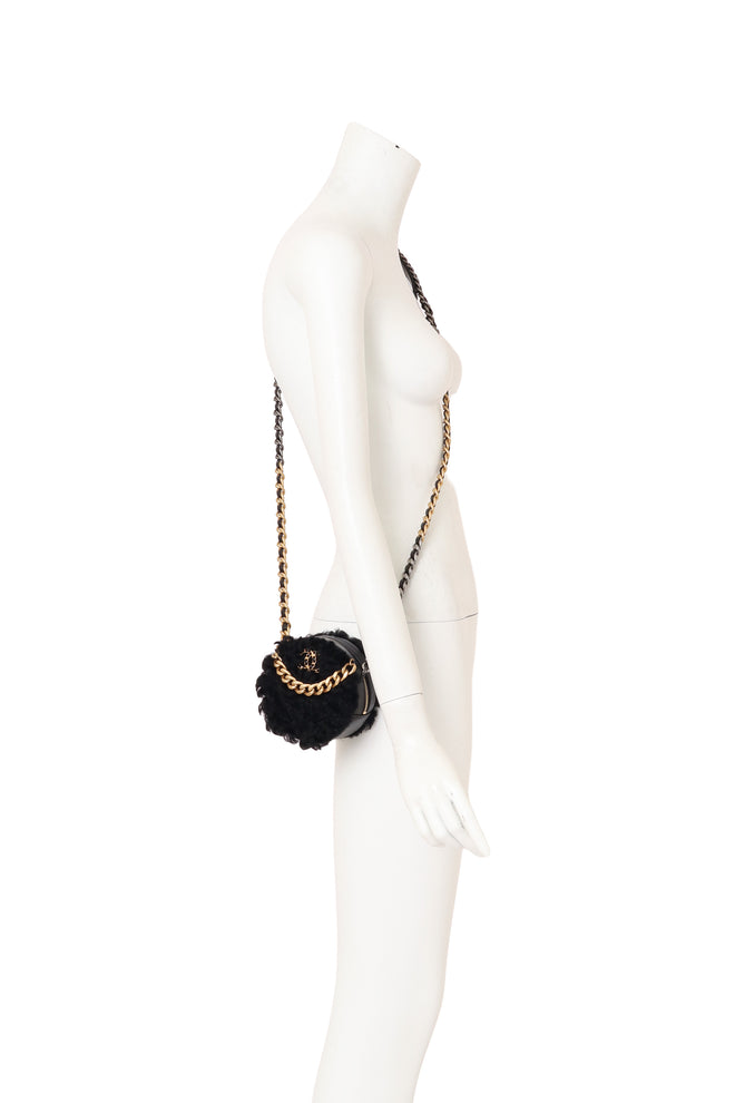 Chanel Shearling Round Vanity Bag on mannequin @ Recess LA