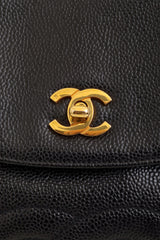Vintage Chanel Caviar CC Backpack clasp @ Recess LA