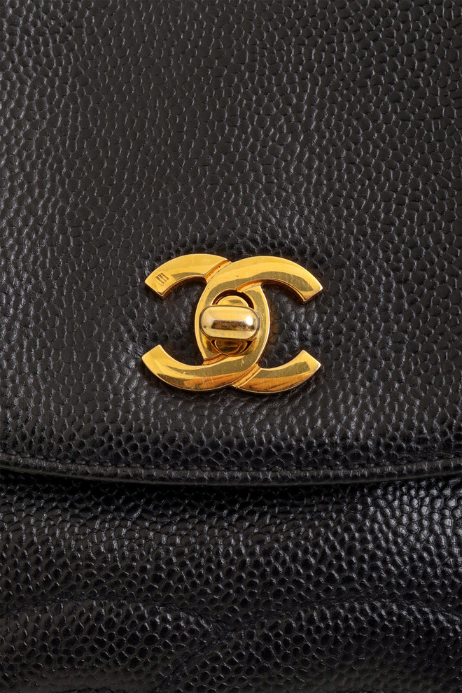 Vintage Chanel Caviar CC Backpack clasp @ Recess LA