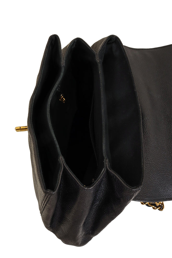 Vintage Chanel Caviar CC Backpack inside @ Recess LA