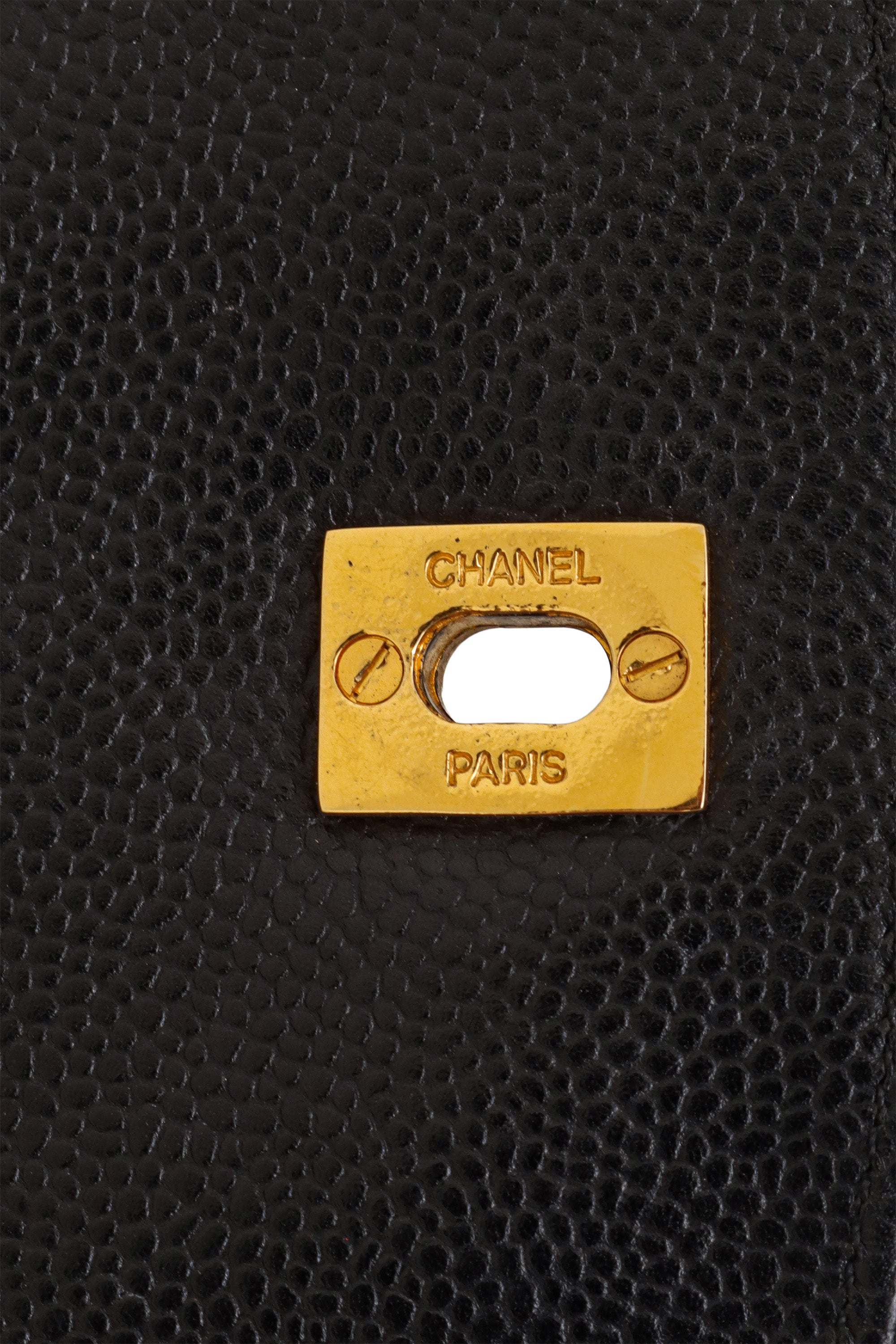 Vintage Chanel Caviar CC Backpack metal logo stamp @ Recess LA