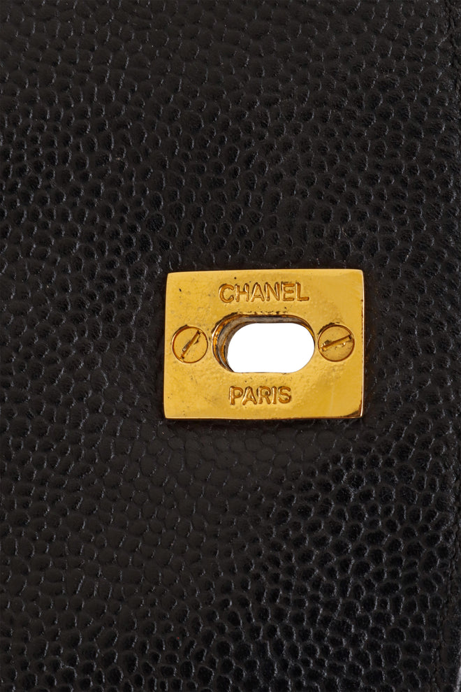 Vintage Chanel Caviar CC Backpack metal logo stamp @ Recess LA