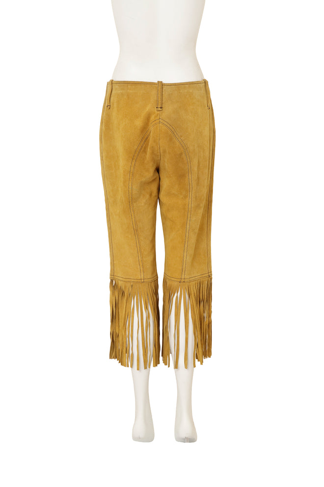 Unsigned vintage suede fringe capri pants on back of mannequin @ Recess LA