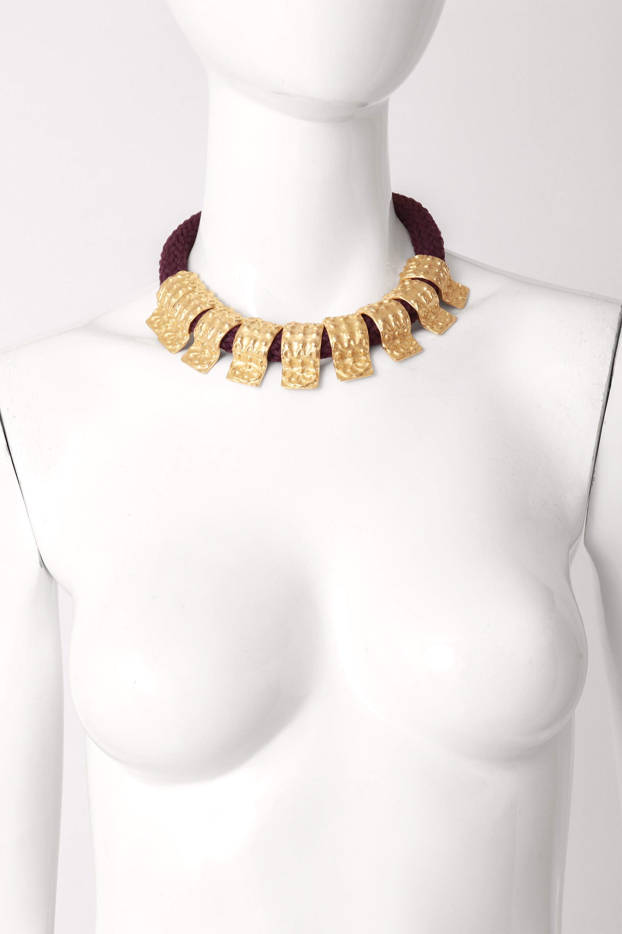 Egyptian revival knit chord necklace on mannequin @ Recess LA