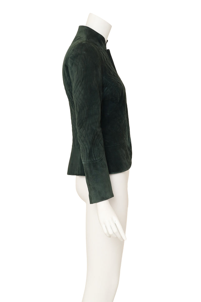 Quilted suede jacket by Gucci on mannequin side @ Recess LA