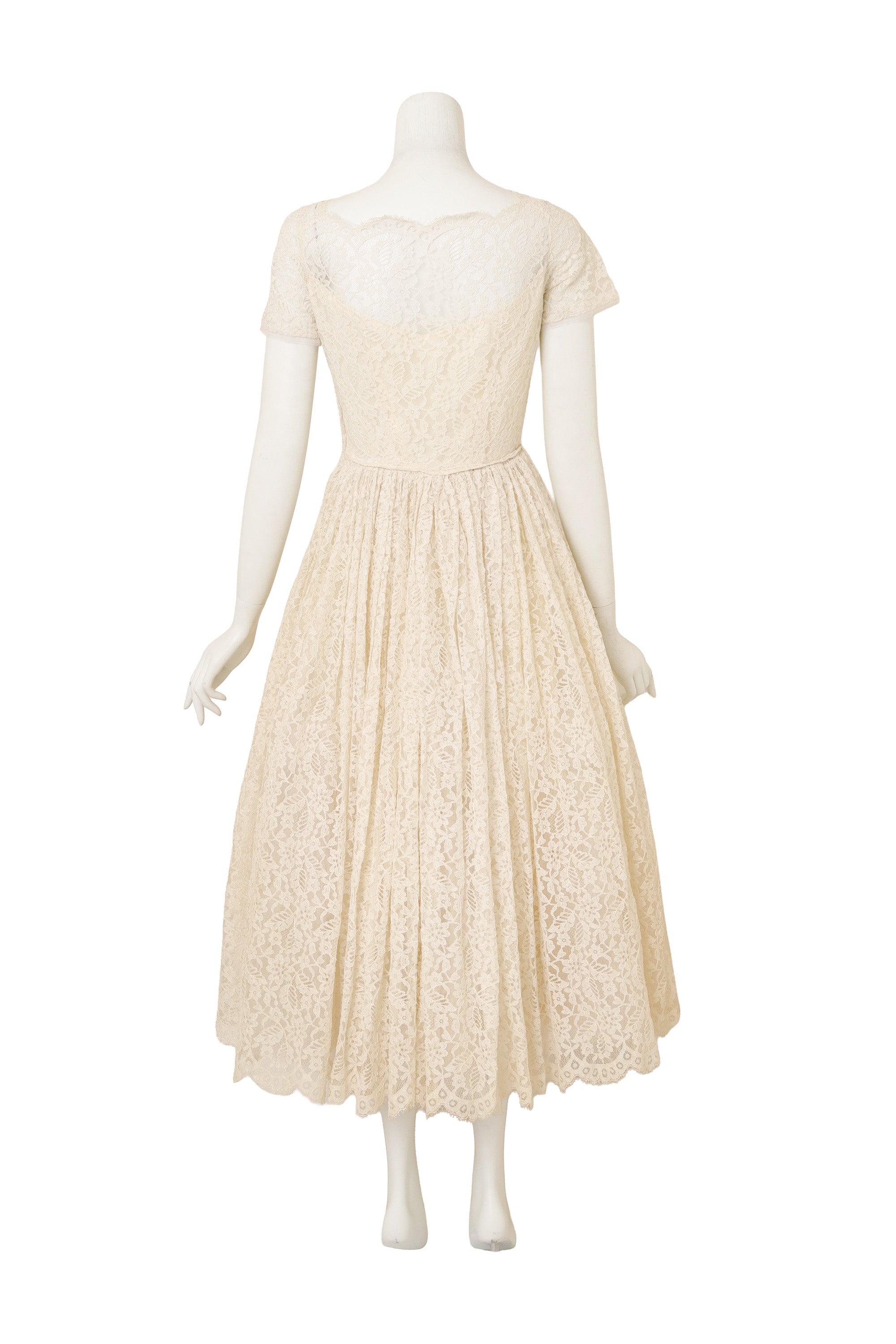 Lace Tea Length Wedding Dress on back of mannequin @ Recess LA