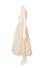 Lace Tea Length Wedding Dress on side of mannequin @ Recess LA