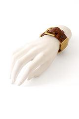 Alligator bracelet by Donna Karan on mannequin hand @ Recess LA