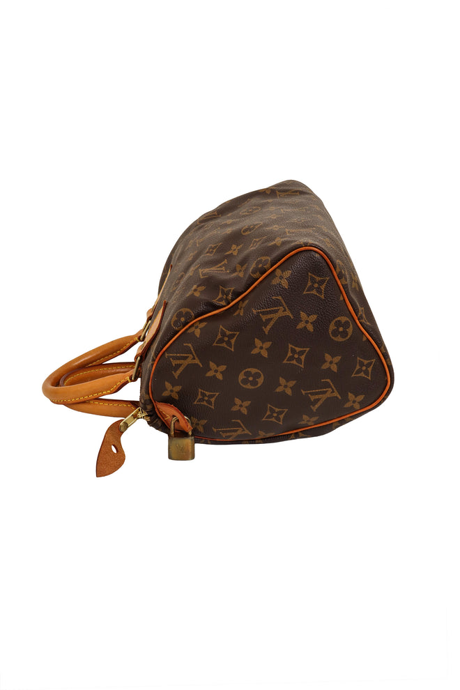 Monogram Canvas Speedy 30 Bag side by Louis Vuitton bag laid flat @ Recess LA