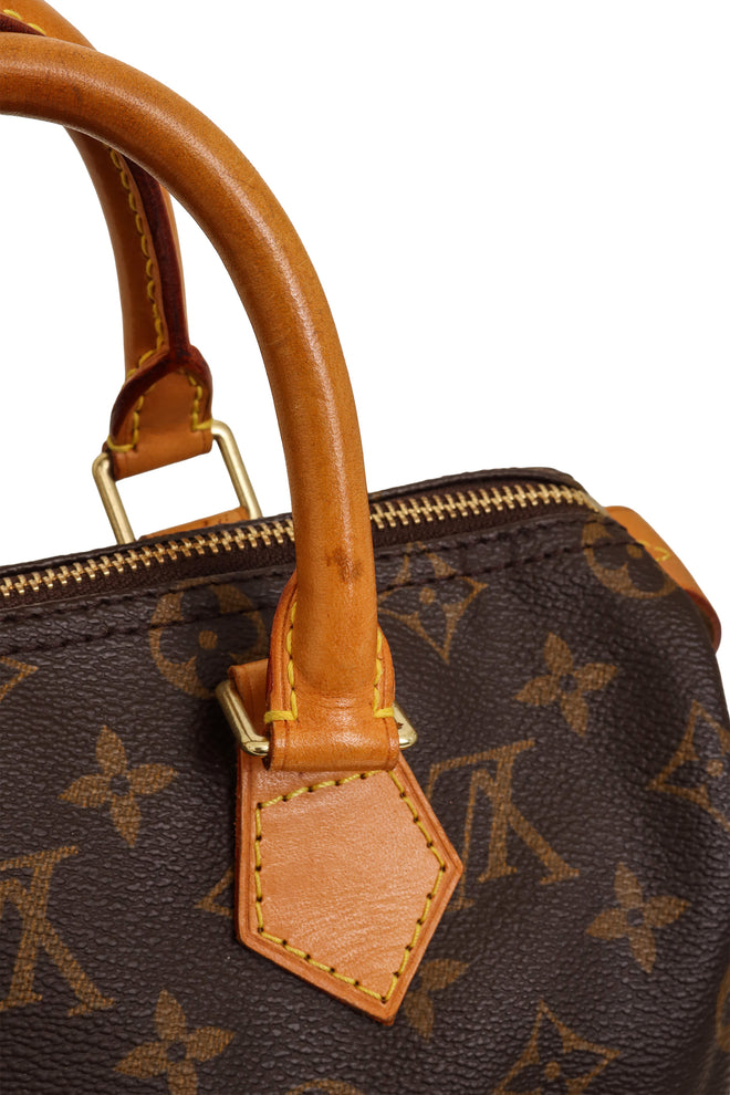 Monogram Canvas Speedy 30 Bag side by Louis Vuitton stain to strap @ Recess LA