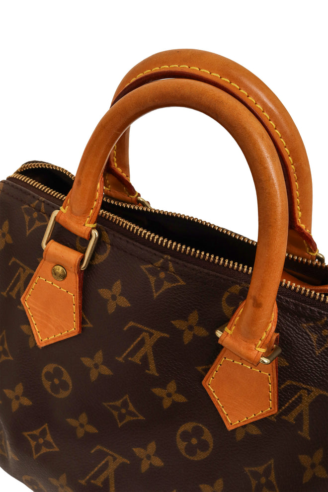Monogram Canvas Speedy 30 Bag side by Louis Vuitton side view of handles @ Recess LA