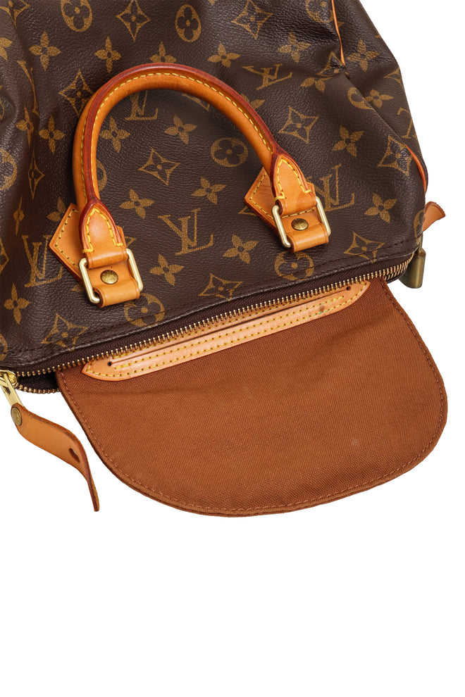 Monogram Canvas Speedy 30 Bag side by Louis Vuitton slip pocket with zipper @ Recess LA