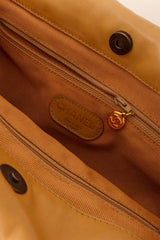 Tortoise shell handle bag by Chanel inside @ Recess LA
