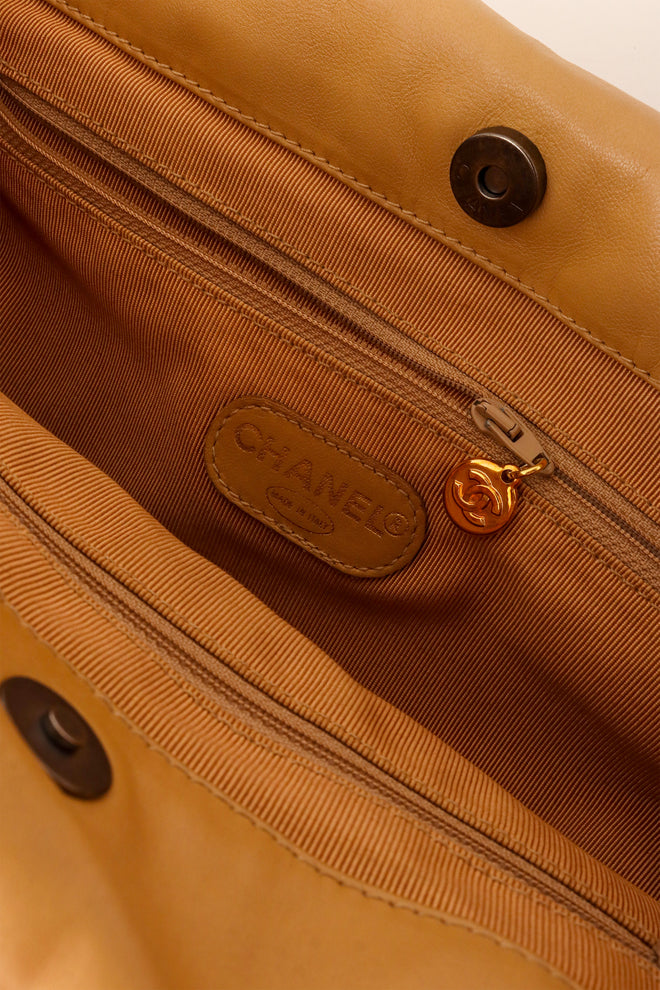 Tortoise shell handle bag by Chanel inside @ Recess LA