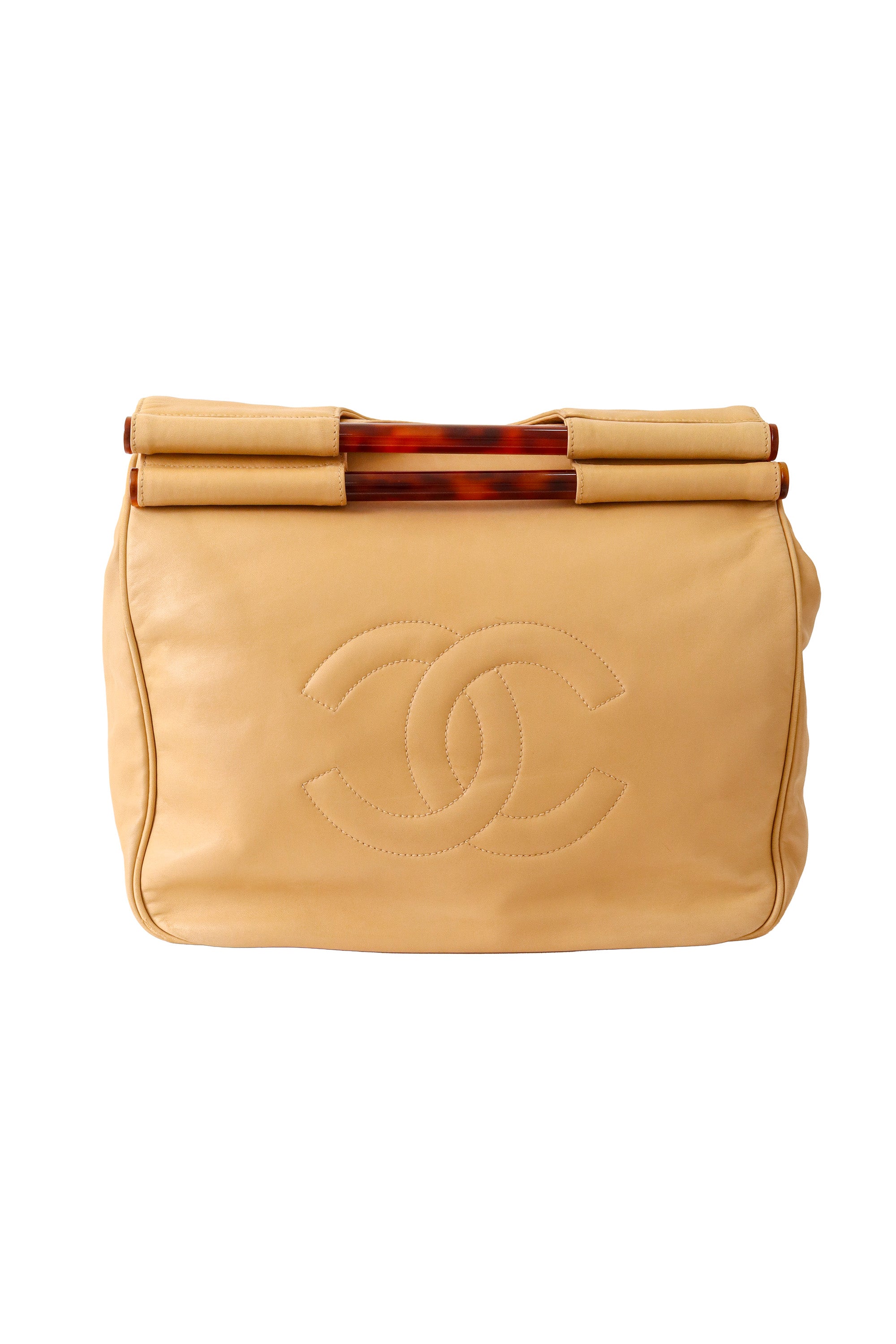 Tortoise shell handle bag by Chanel folded over @ Recess LA