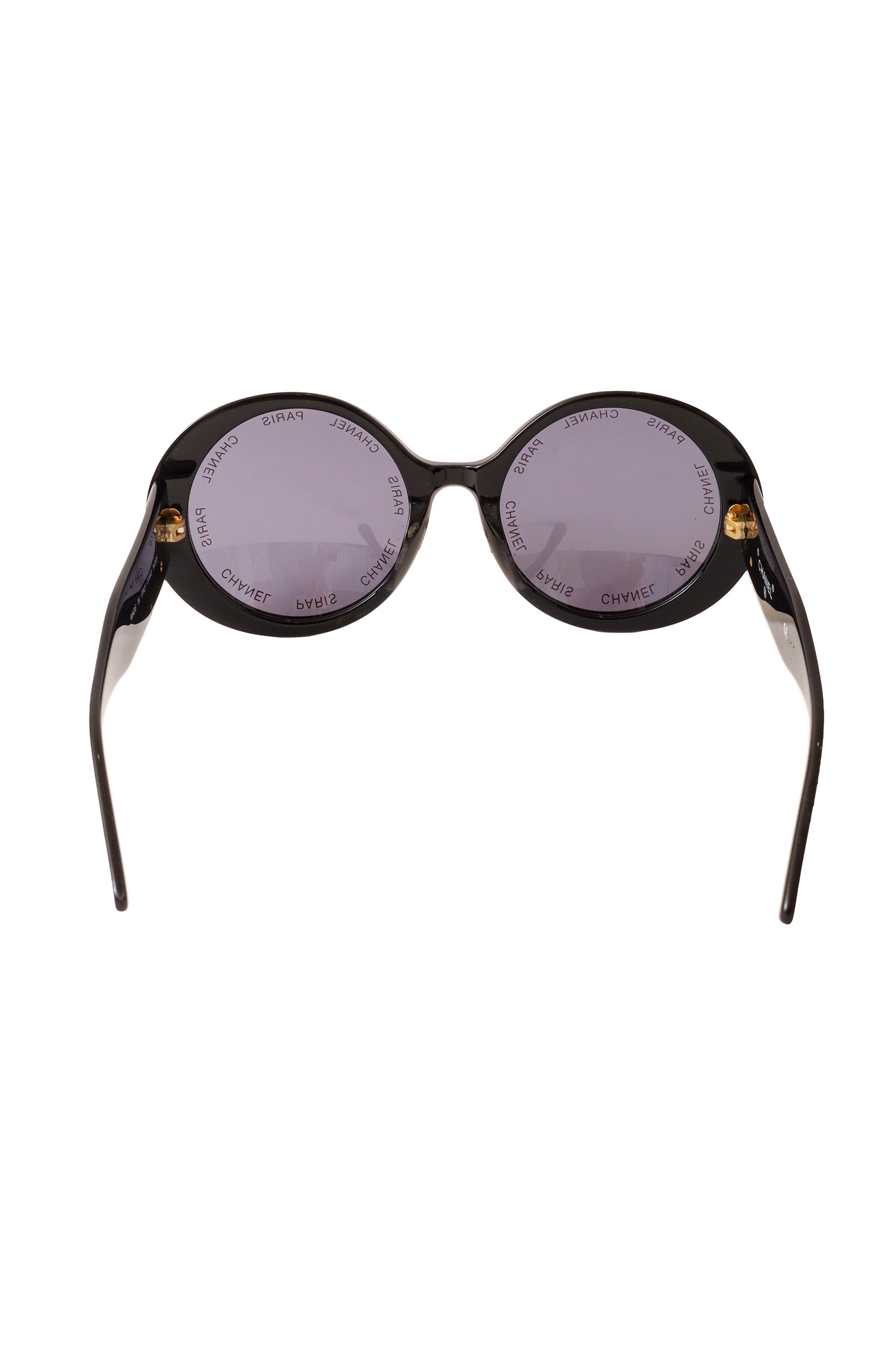 Oversize round sunglasses by Chanel inside lenses @ Recess LA