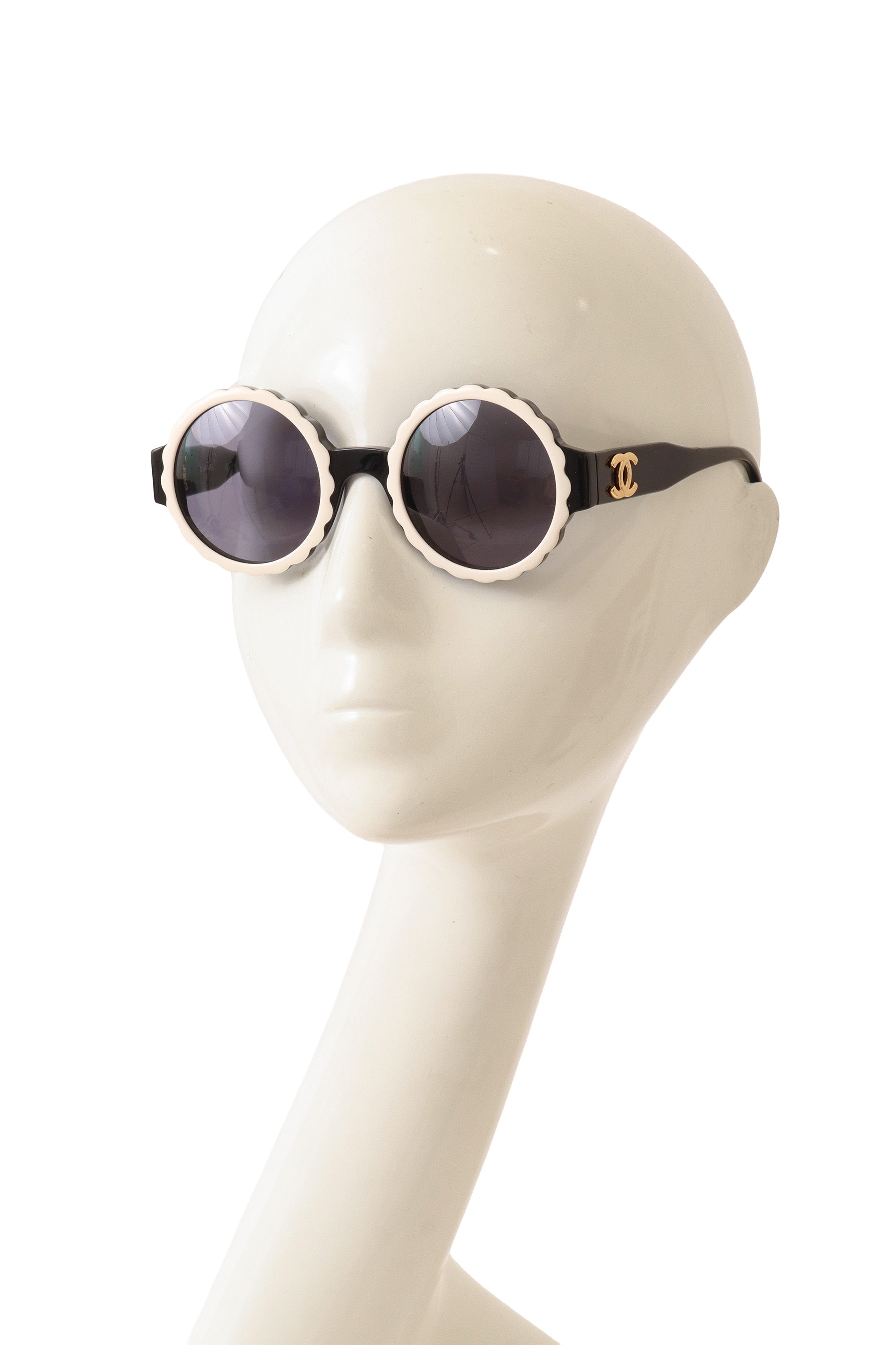 scalloped sunglasses by Chanel on mannequin side @ Recess LA
