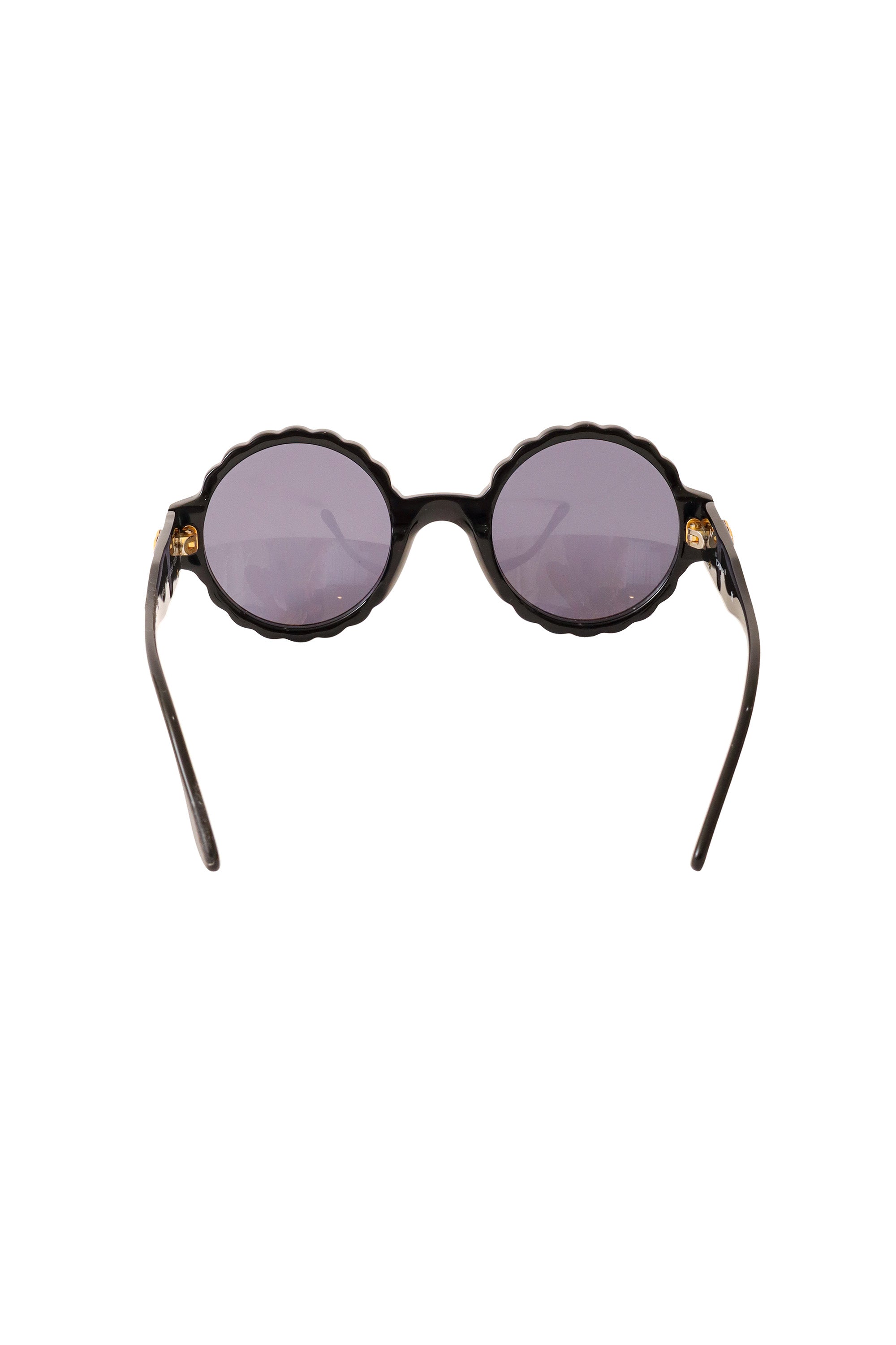 scalloped sunglasses by Chanel inside lenses @ Recess LA