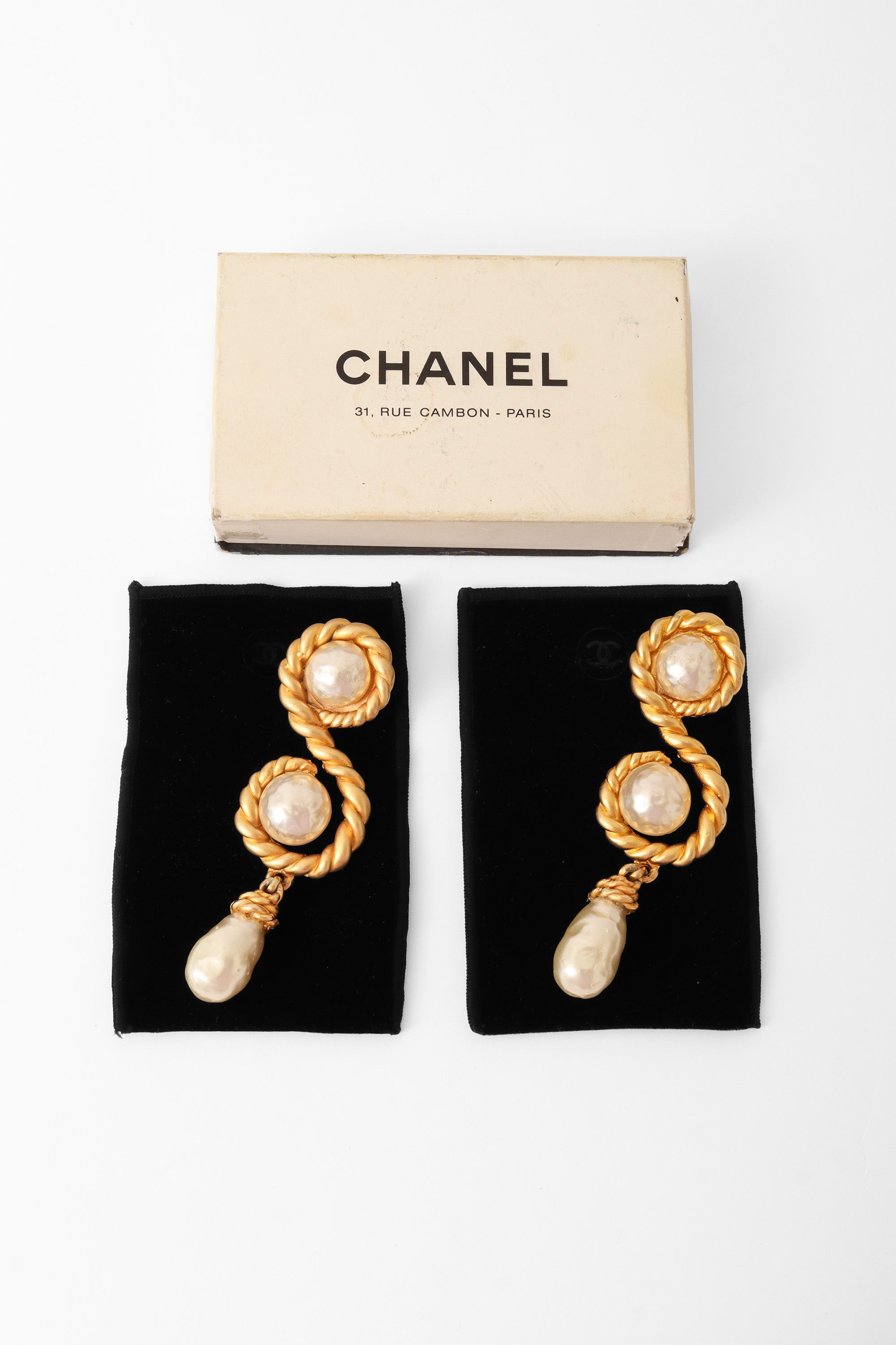 Double pearl twist earrings by Chanel from the 1990 Spring Summer collection with box @ Recess LA 