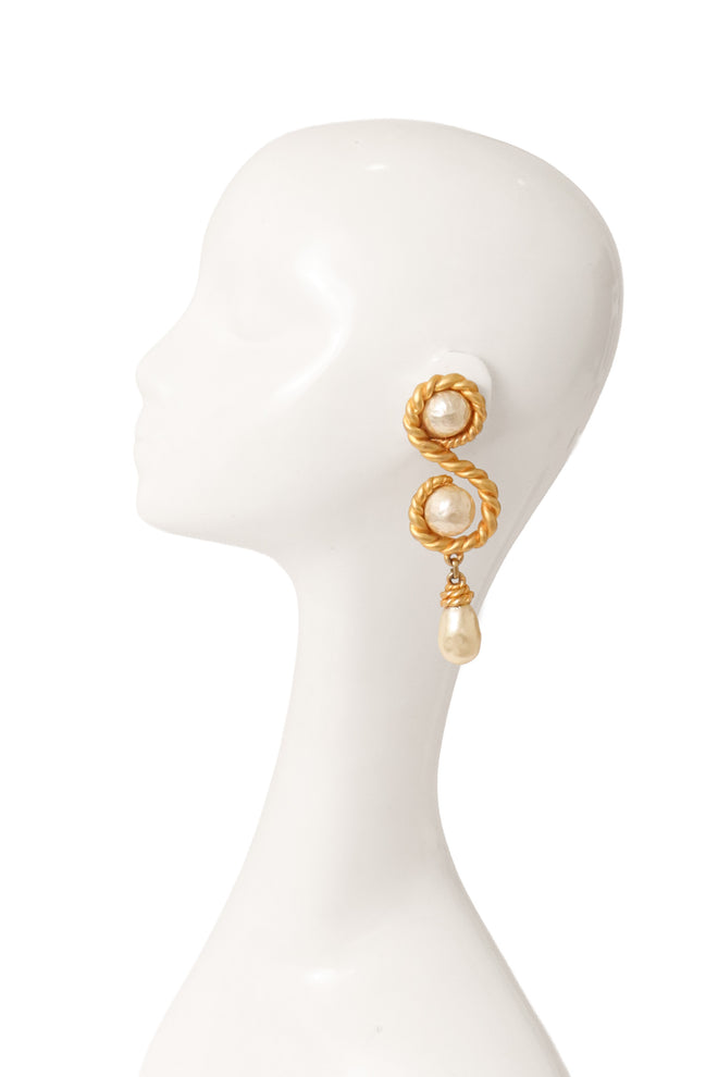 Double pearl twist earrings by Chanel on mannequin @ Recess LA 