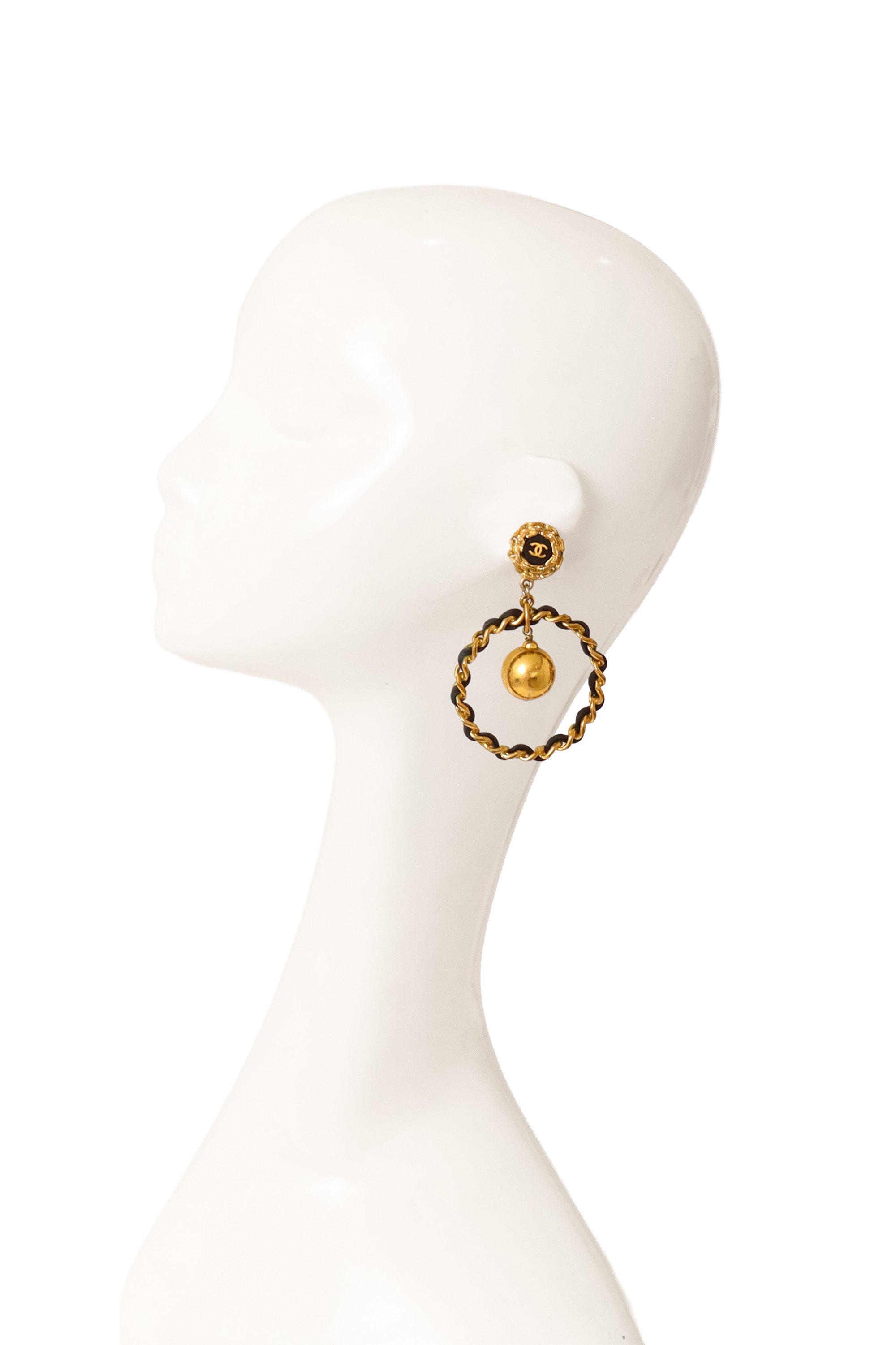 Leather chain hoop earrings by Chanel on mannequin @ Recess LA