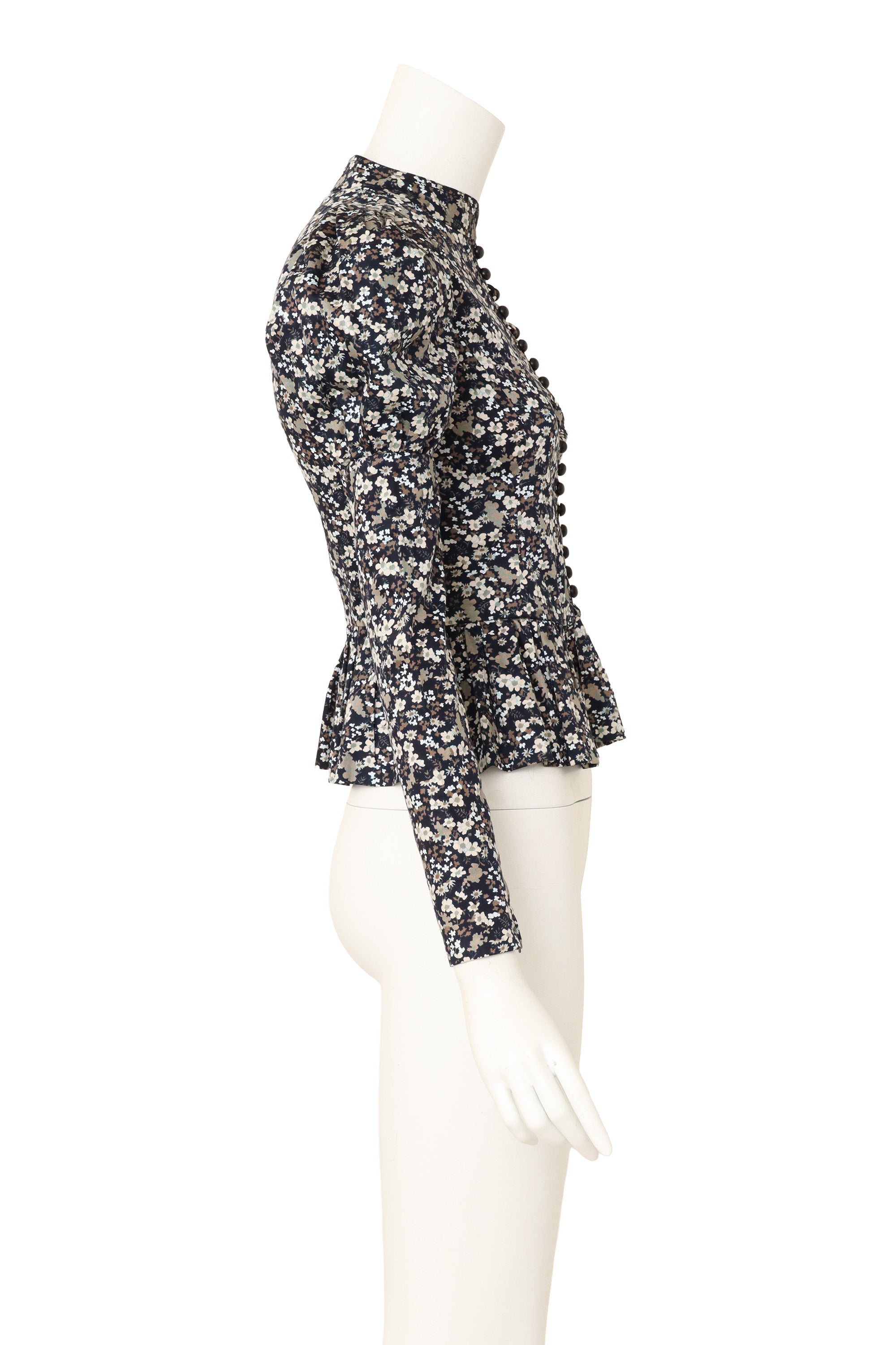 peplum blouse by Saint Laurent on mannequin side @ Recess LA