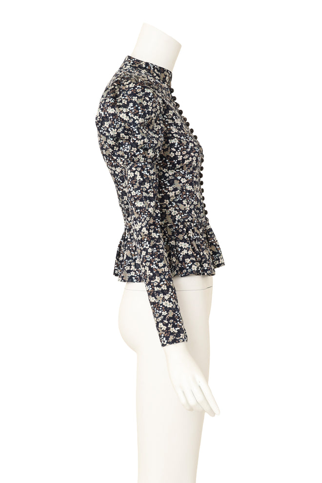 peplum blouse by Saint Laurent on mannequin side @ Recess LA